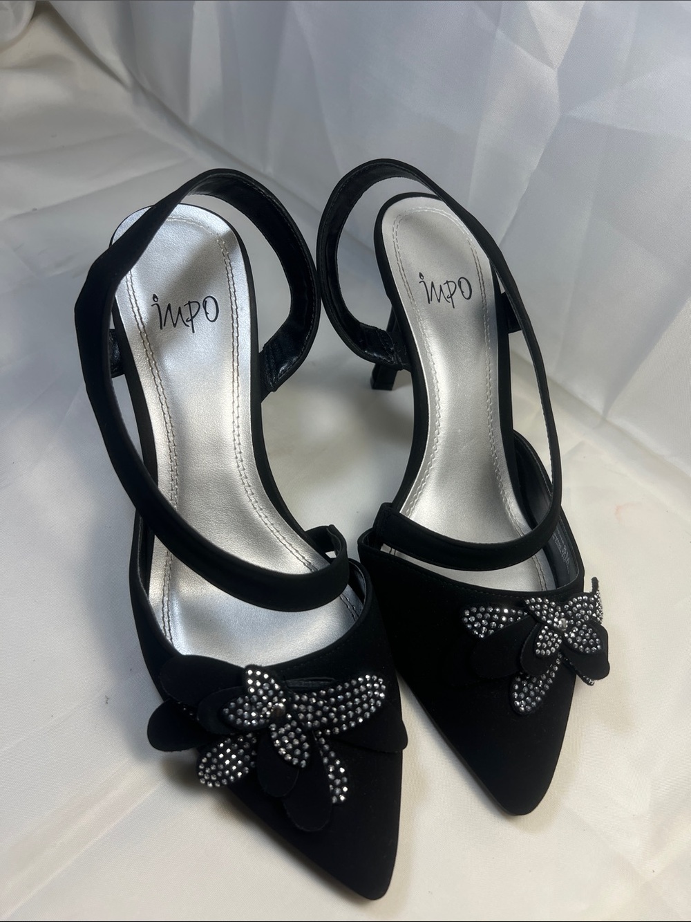 Impo Black Pointed Toe Slingback Heels with Crystal Floral Accent